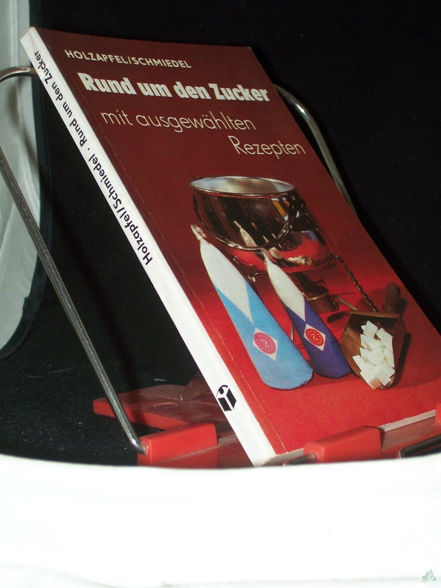 Artikelbild 1 des Artikels “Rund um den Zucker / Gerhard Holzapfel ; Helga Schmiedel. Vignetten von Egbert Herfurth “