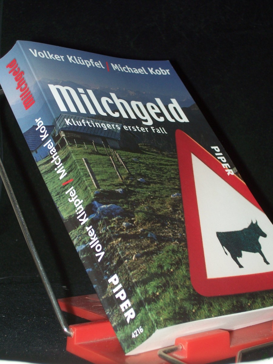 Artikelbild 1 des Artikels “Milchgeld : Kluftingers großer Fall / Volker Klüpfel ; Michael Kobr “