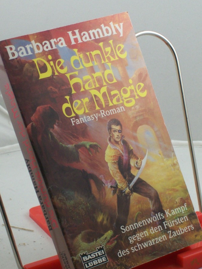 Artikelbild 1 des Artikels “Die dunkle Hand der Magie : Fantasy-Roman / Barbara Hambly. Ins Dt. übertr. von Ute Thiemann “