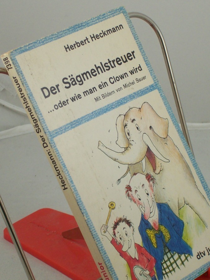 Product image 1 of the product “Der Sägmehlstreuer... oder wie man ein Clown wird / Herbert Heckmann. Mit Bildern von Michel Sauer ”