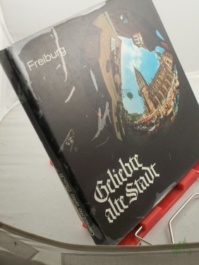 Artikelbild des Artikels “Geliebte alte Stadt : Bilder aus Freiburg / Gesehen v. Leif Geiges. Hrsg. v. Siegfried Büche.... in Zsarb. mit Ingeborg Krummer-Schroth “