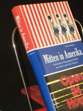 Product image of the product “Mitten in Amerika : amüsante Alltagsgeschichten aus dem Land der Träume / Peter Woeste ”
