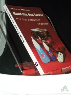 Artikelbild des Artikels “Rund um den Zucker / Gerhard Holzapfel ; Helga Schmiedel. Vignetten von Egbert Herfurth “