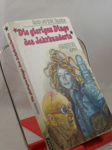 Artikelbild des Artikels “Die gierigen Dinge des Jahrhunderts : phantast. Roman / Arkadi u.
Boris Strugazki. Aus d. Russ. von Heinz Kübart “
