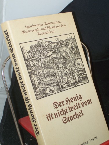 Artikelbild des Artikels “Der Honig ist nicht weit vom Stachel : Sprichwörter, Redensarten,
Wetterregeln u. Rätsel aus d. Bauernleben / ges., hrsg. u. mit e.
Nachw. vers. von Werner Richey u. Michael Strich “