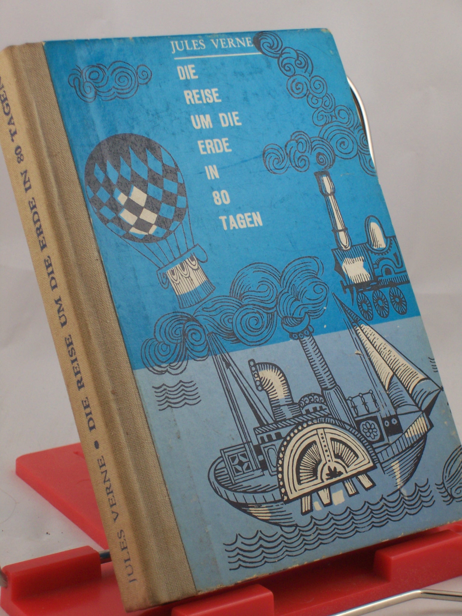 Artikelbild 1 des Artikels “Die Reise um die Erde in 80 Tagen / Jules Verne. Aus d. Franz. Von
Dorothea Rahm überarb. Übers. “
