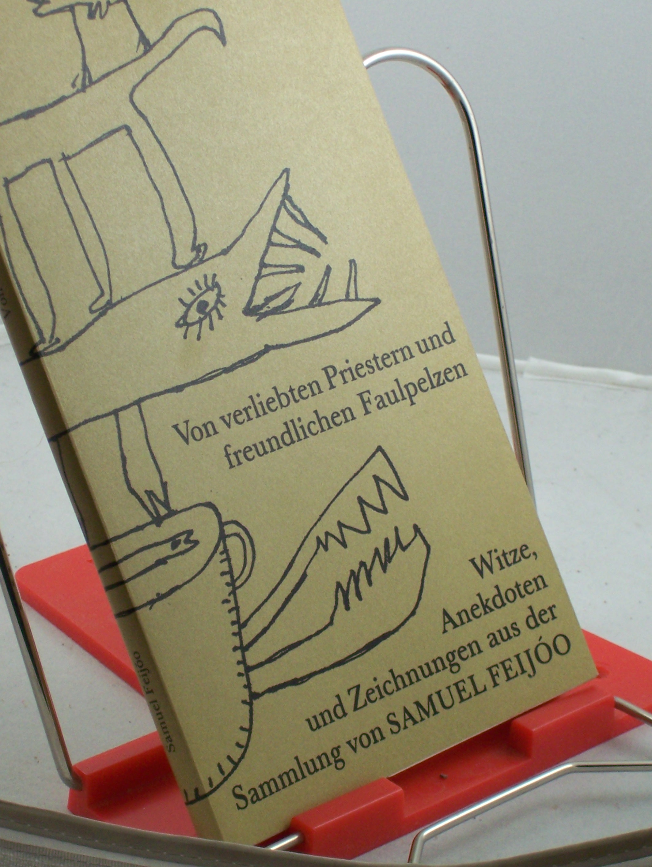 Artikelbild 1 des Artikels “Von verliebten Priestern und freundlichen Faulpelzen : Witze, Anekdoten und Zeichnungen / aus der Sammlung von Samuel Feijóo. Aus dem Span. von Christel Dobenecker. Ausw. und Zsstellung der Texte: Heide Brang “