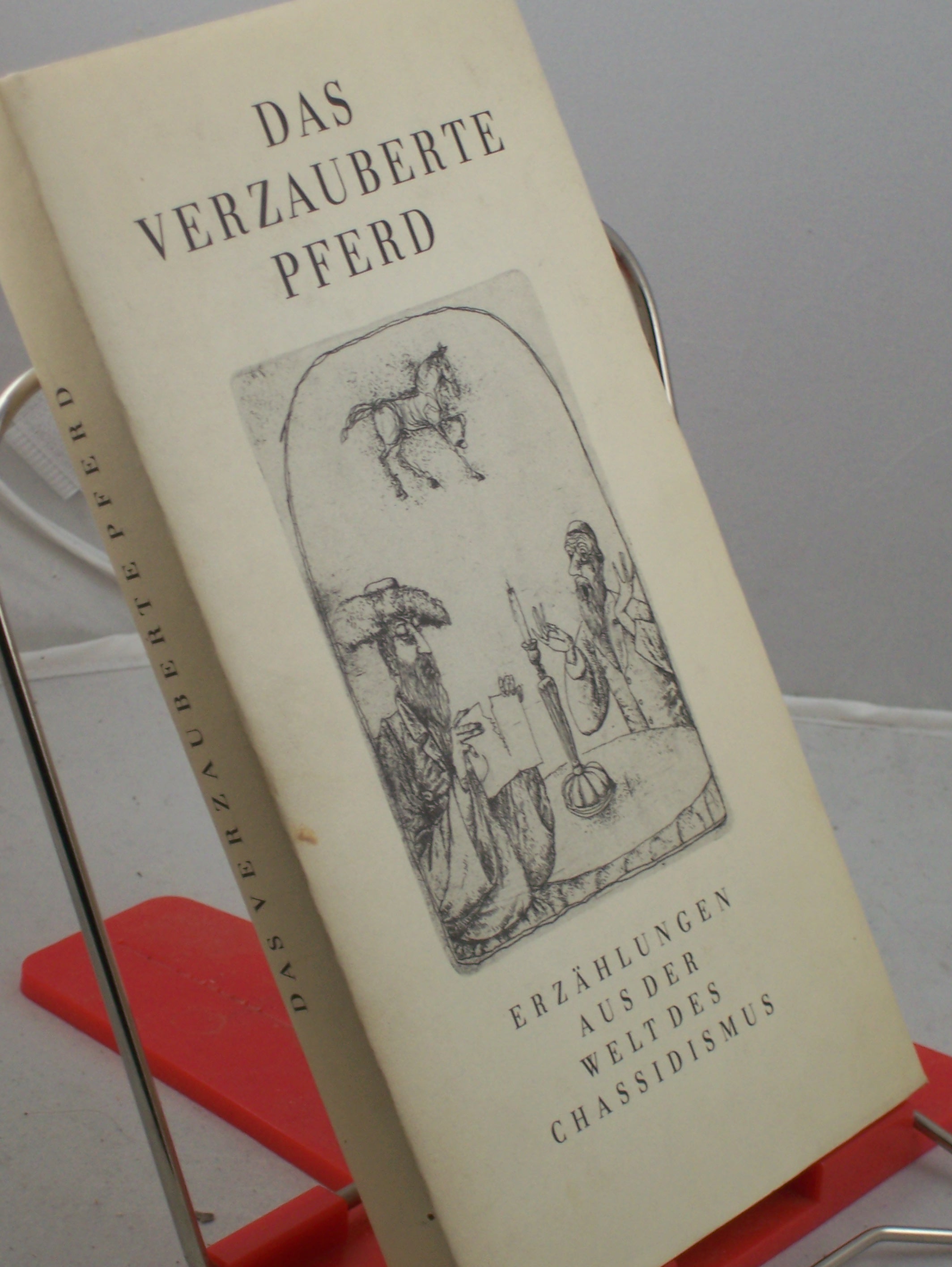 Artikelbild 1 des Artikels “Das verzauberte Pferd : Erzählungen aus d. Welt d. Chassidismus / aus d. Jidd. übers. von Alexander Eliasberg u. Mathias Acher. Nach Ausg. von Alexander Eliasberg u. Jizchak Leib Perez ausgew., mit e. Einl. vers. u. erl. von Ludwig Wächter “