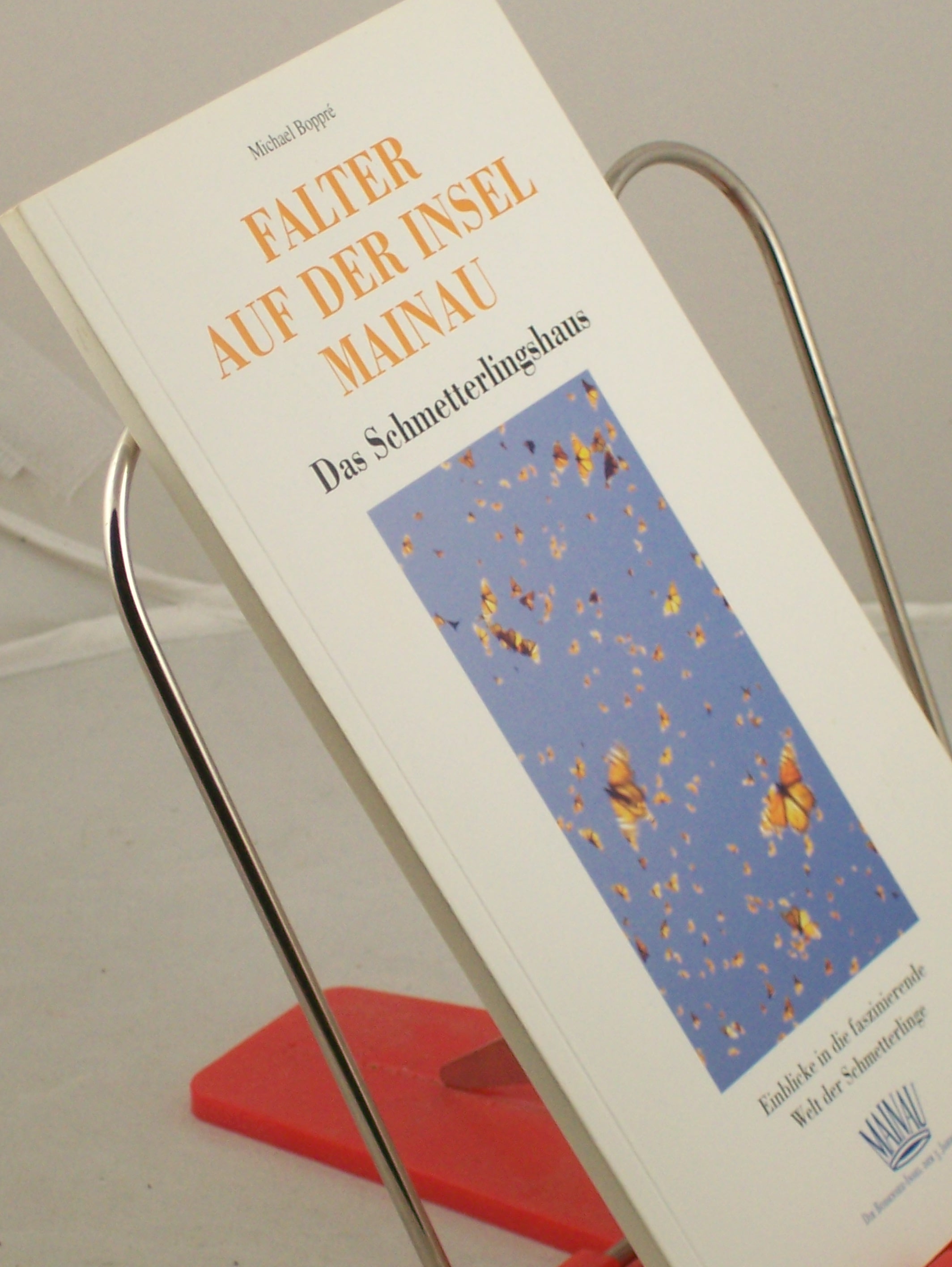 Artikelbild 1 des Artikels “Falter auf der Insel Mainau : das Schmetterlingshaus ; Einblicke in die faszinierende Welt der Schmetterlinge / Michael Boppré. Hrsg.: Blumeninsel Mainau GmbH. Aquarellzeichn.: Gunnar Brehm “