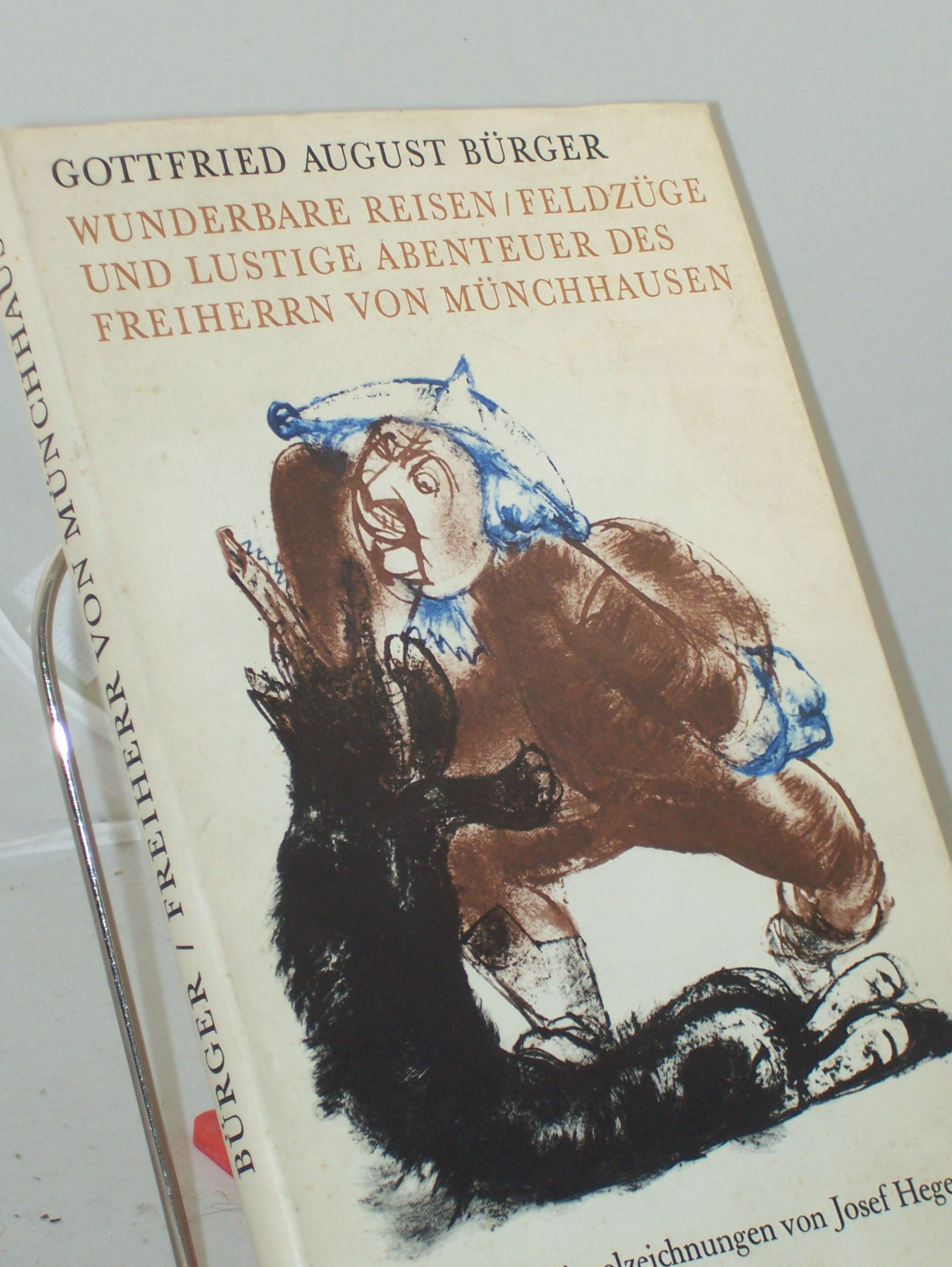 Artikelbild 1 des Artikels “Wunderbare Reisen, Feldzüge und lustige Abenteuer des Freiherrn von Münchhausen in Russland, wie er dieselben bei der Flasche im Zirkel seiner Freunde zu erzählen pflegt / Gottfried August Bürger. Mit 20 Pinselzeichn. von Josef Hegenbarth. “