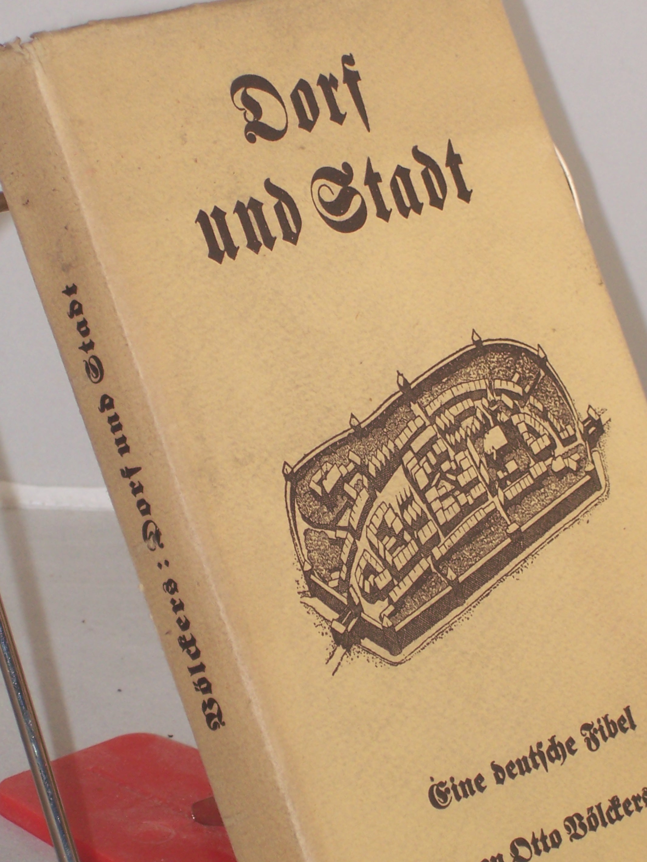 Artikelbild 1 des Artikels “Dorf und Stadt : Eine dt. Fibel / Otto Völckers “