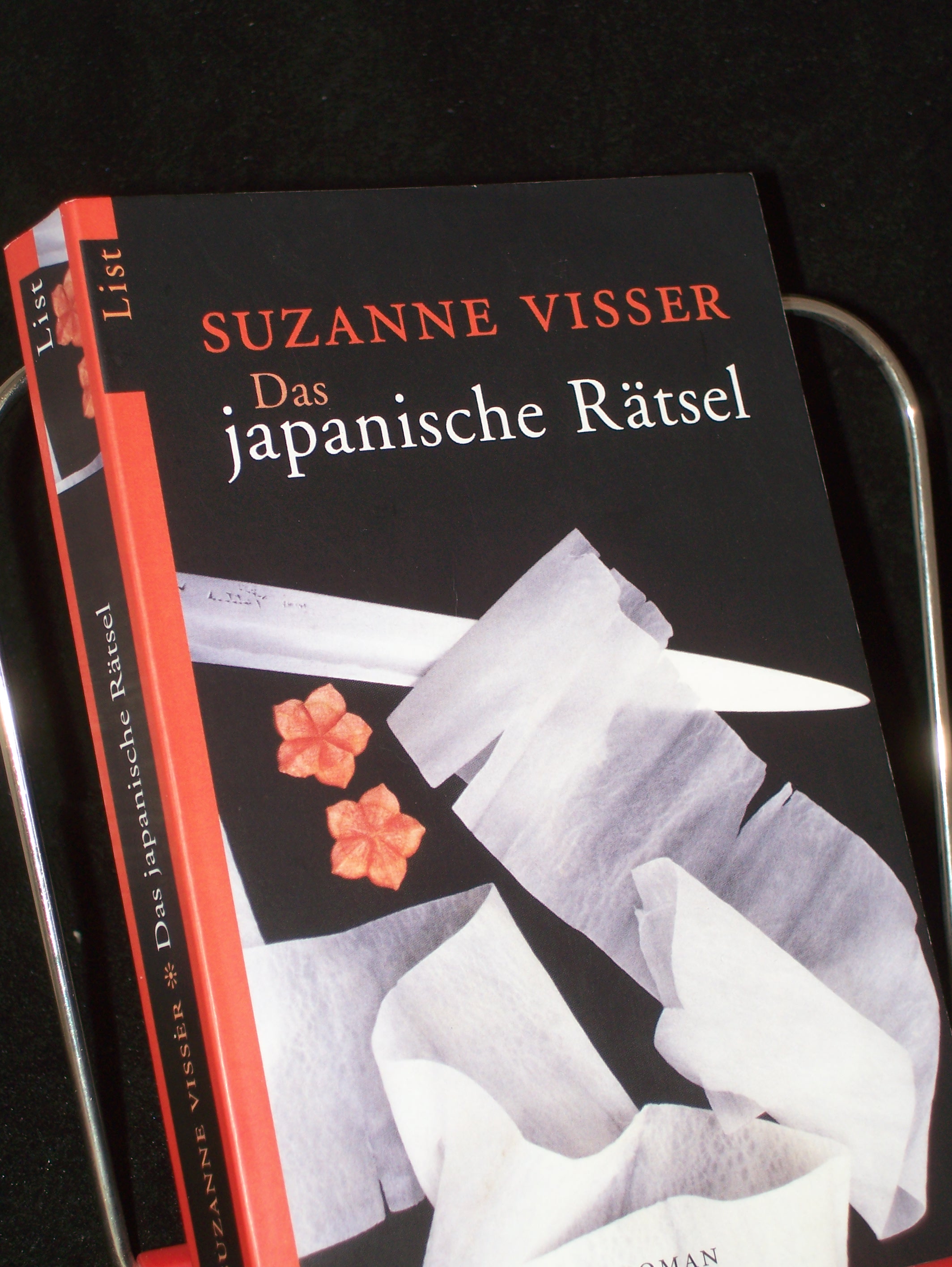 Artikelbild 1 des Artikels “Das japanische Rätsel : Roman / Suzanne Visser. Aus dem Niederländ.
von Marianne Holberg “