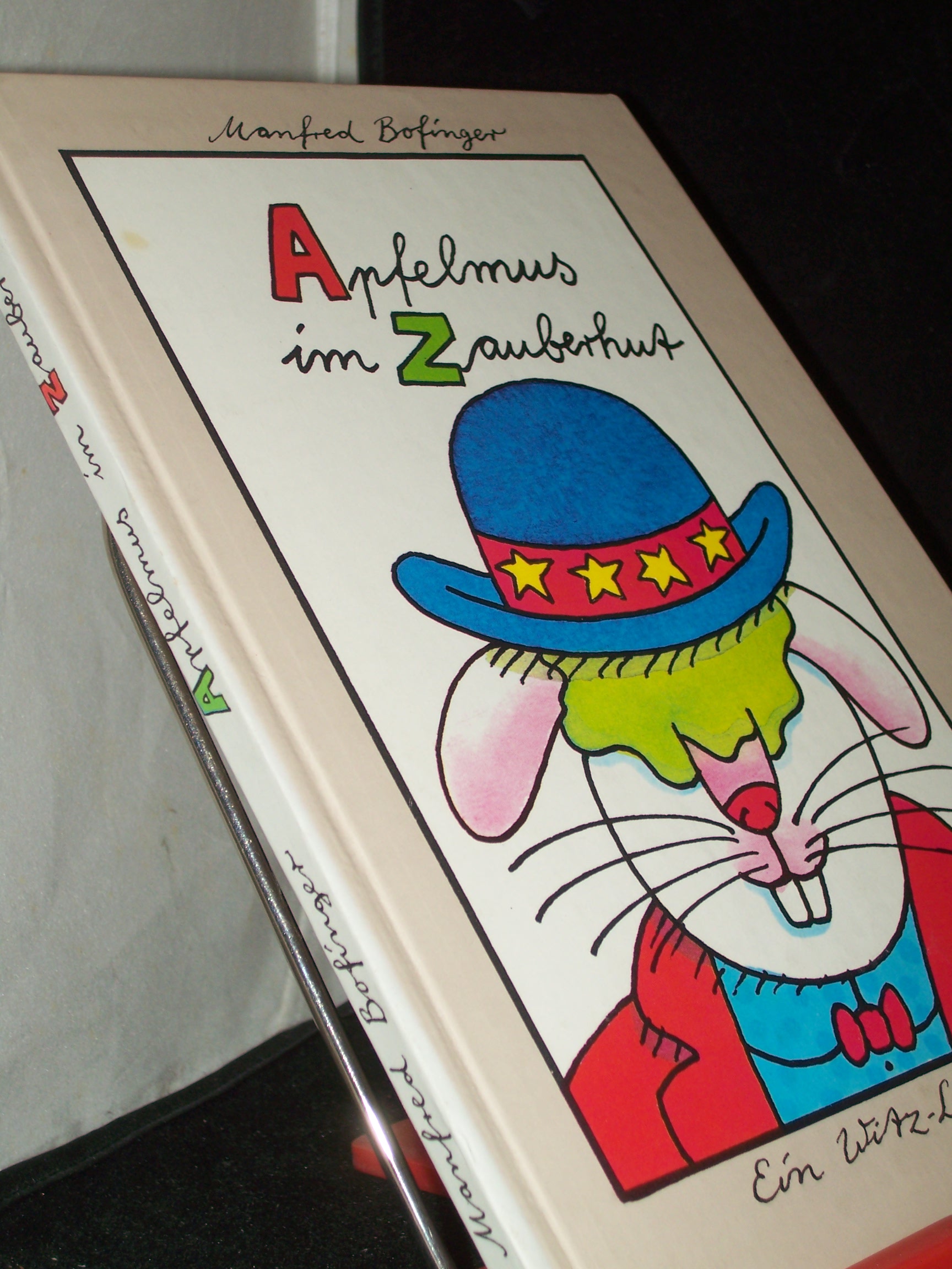 Artikelbild 1 des Artikels “Apfelmus im Zauberhut : e. Witz-Lexikon / Manfred Bofinger “