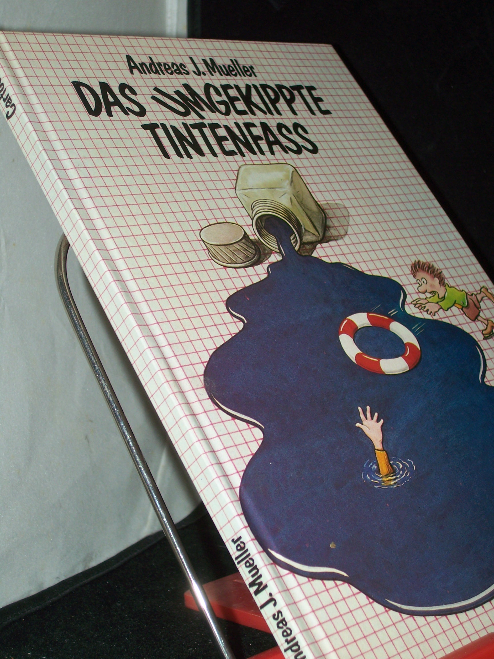 Artikelbild 1 des Artikels “Das umgekippte Tintenfass : Cartoons / Andreas J. Mueller “